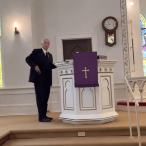 pastor Hans preparing for the sermon