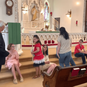 pastor Hans giving the children's sermon