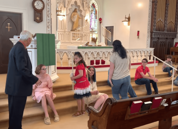pastor Hans giving the children's sermon